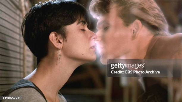 The movie "Ghost", directed by Jerry Zucker and written by Bruce Joel Rubin. Seen here, Demi Moore as Molly Jensen and Patrick Swayze as Sam Wheat in...