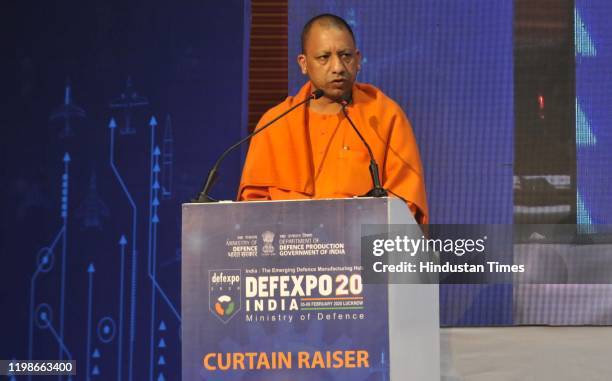 Chief Minister of Uttar Pradesh Yogi Adityanath addresses the gathering during the curtain raiser ceremony of DefExpo 2020 at Indira Gandhi...