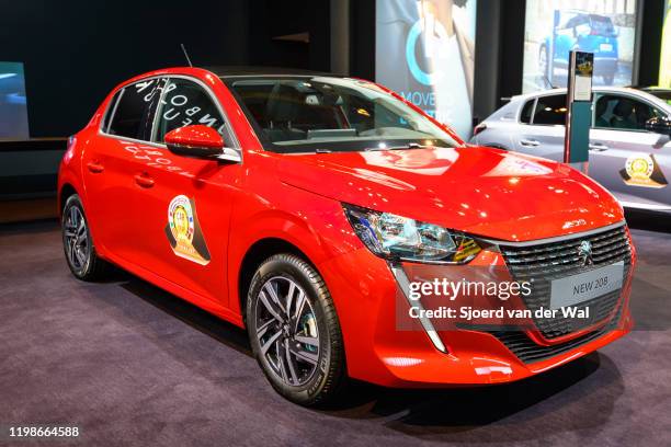 Peugeot 208 compact hatchback car on display at Brussels Expo on JANUARY 09, 2020 in Brussels, Belgium. The Peugeot 208 is available with various...