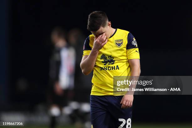 Liam Kelly of Oxford United dejected at full time of the FA Cup Fourth Round Replay match between Oxford United and Newcastle United at Kassam...