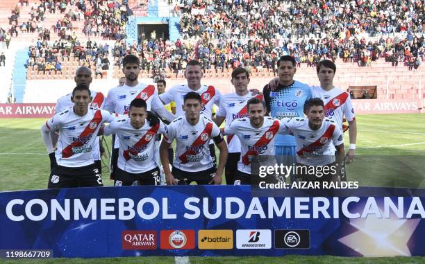 The players Bolivia's Nacional Potosi pose for pictures before the start of their Copa Sudamericana football match against Peru's Melgar at Victor...