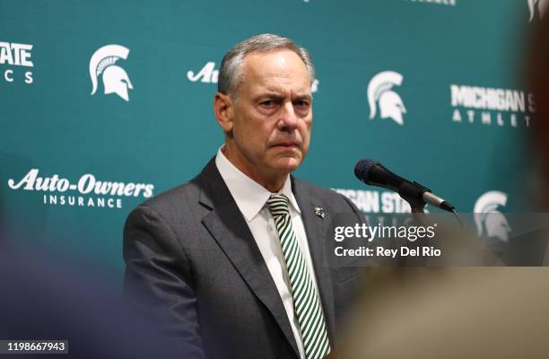 Head coach Mark Dantonio of the Michigan State Spartans addresses the media after announcing his retirement before the game between the Michigan...