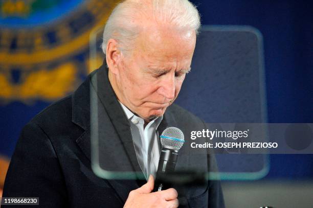 Presidential candidate and former US Vice President Joe Biden gestures as he addresses supporters and curious voters at the IBEW Local 490 in...