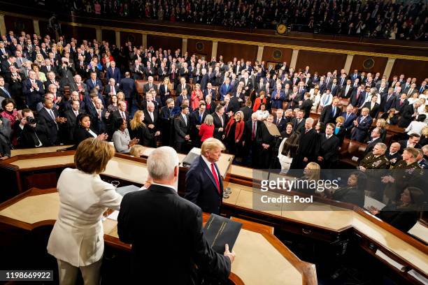 President Donald Trump walks to the lectern to deliver the State of the Union address at the U.S. Capitol on February 4, 2020 in Washington, DC....