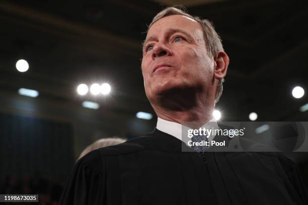 Supreme Court Chief Justice John Roberts awaits the arrival to hear President Donald Trump deliver the State of the Union address in the House...