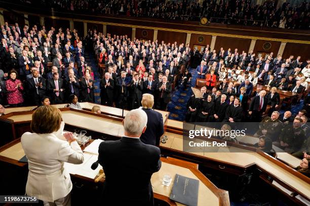 House Speaker Rep. Nancy Pelosi rips up pages of the State of the Union speech after U.S. President Donald Trump finishes speaking at the U.S....