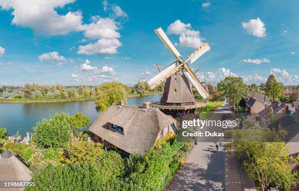 Windmill called De Vriendschap at the bank of the river Vecht, Weesp, Noord-Holland, , Netherlands, 30071271.