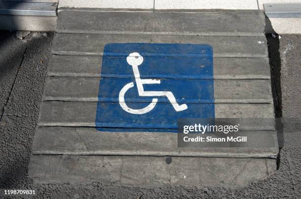 concrete wheelchair access ramp to a shop entrance - makeshift ramp stock pictures, royalty-free photos & images