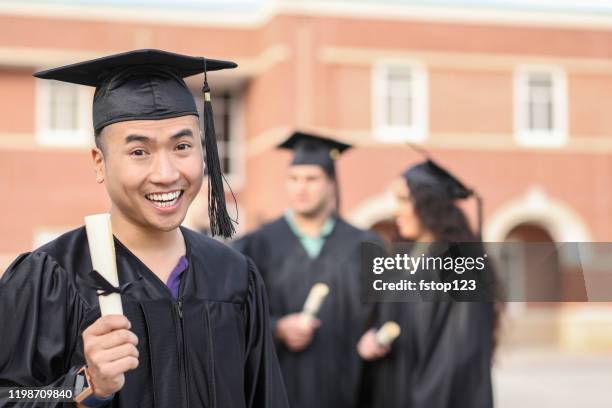 asian descent male college student graduation on campus. - vietnamese ethnicity stock pictures, royalty-free photos & images