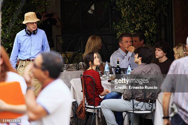 Director Woody Allen, actors Ellen Page, Alec Baldwin and Jesse Eisemberg look on during the filming of "To Rome With Love," at Piazza Madonna Dei...