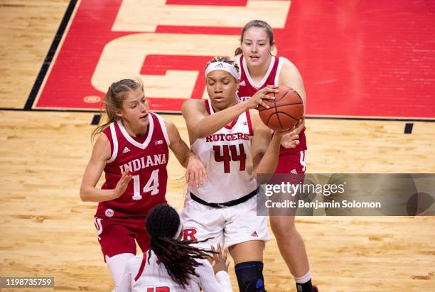 Jordan Wallace of the Rutgers Scarlet Knights is guarded by Ali Patberg of the Indiana Hoosiers at Rutgers Athletic Center on December 31, 2019 in...