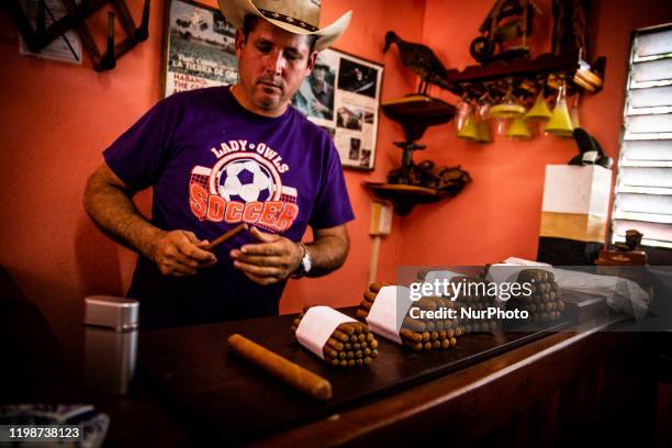 Man show how to create a cigar in Reparto Conchita, Cuba, on January 18, 2020. Vinales is a small town and municipality in the north-central Pinar...