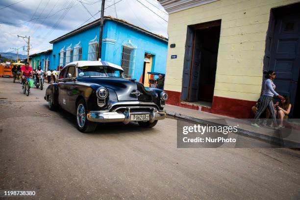 An american car is seen in Trinidad, Cuba, on January 21, 2020. Trinidad is a town in the province of Sancti Spíritus, central Cuba. Together with...