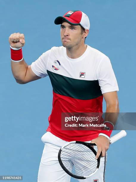 Dusan Lajović of Serbia celebrates winning set point during his semi-final singles match against Karen Khachanov of Russia during day nine of the...