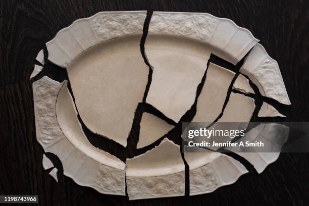 put back together - breaking plate stock pictures, royalty-free photos & images