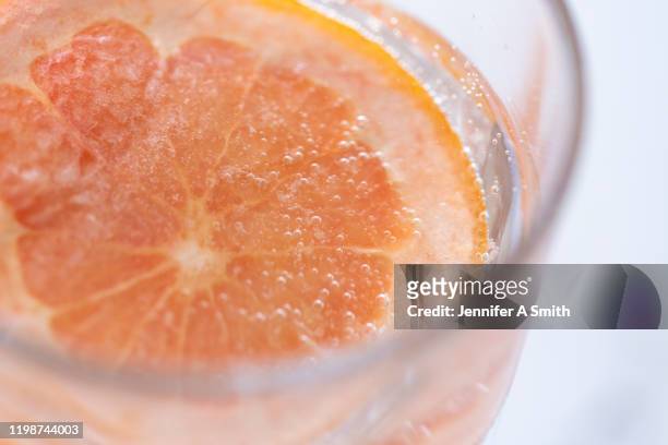 effervescent - grapefruit cocktail stock pictures, royalty-free photos & images