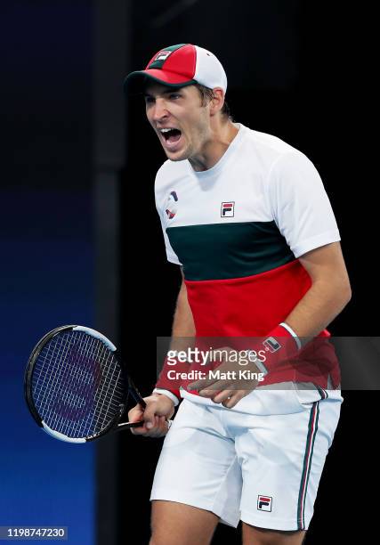 Dusan Lajović of Serbia celebrates winning a point during his semi-final singles match against Karen Khachanov of Russia during day nine of the 2020...