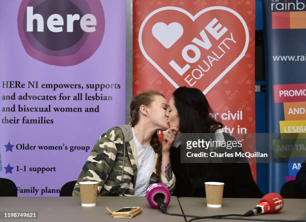 Robyn Peoples and Sharni Edwards, Northern Ireland's first same-sex couple to be legally married, kiss during a pre-wedding press conference on...