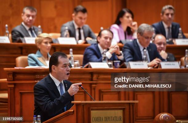 Romanian Prime Minister Ludovic Orban delivers his speech during a no-confidence vote initiated by the Social Democrat Party at the Romanian...