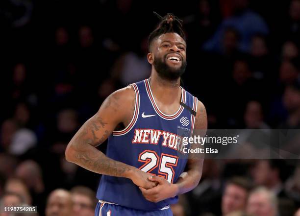 Reggie Bullock of the New York Knicks leaves the game with an injured hand in the second half against the New Orleans Pelicans at Madison Square...