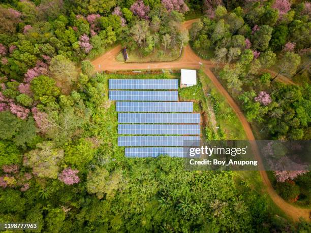 aerial view of solar cell panels installation on the high mountains in remote area of northern thailand. - solar powered station fotografías e imágenes de stock