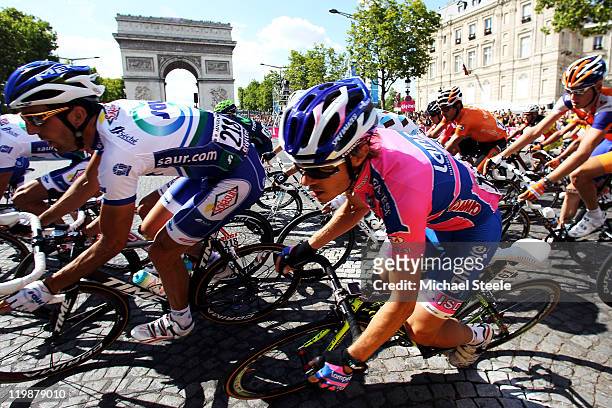 Damiano Cunego of team Lampre leans through the corner during the twenty first and final stage of Le Tour de France 2011, from Creteil to the...