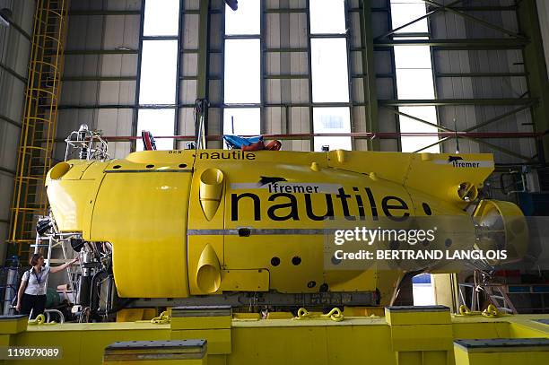 French Research Institute for Exploration of the Sea Nautile, a manned submarine designed for observing ocean floors, is pictured prior to boarding a...