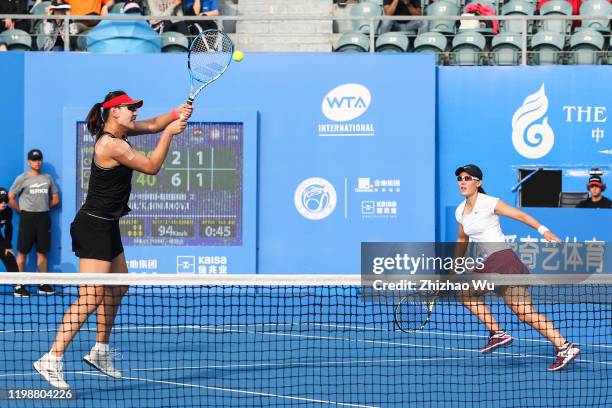 Duan Yingying and Zheng Saisai of China return a shot during the women's doubles final match against Barbora Krejcikova and Katerina Siniakova of...