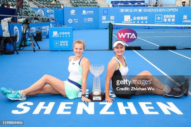 Barbora Krejcikova and Katerina Siniakova of Czech, winners of the women's doubles final match attend the award ceremony on day 7 of the 2020 WTA...