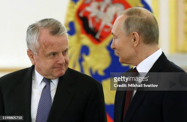 Russian President Vladimir Putin speaks to Newly appointed U.S. Ambassador to Russia John Sullivan during the ceremony for President Putin to receive...