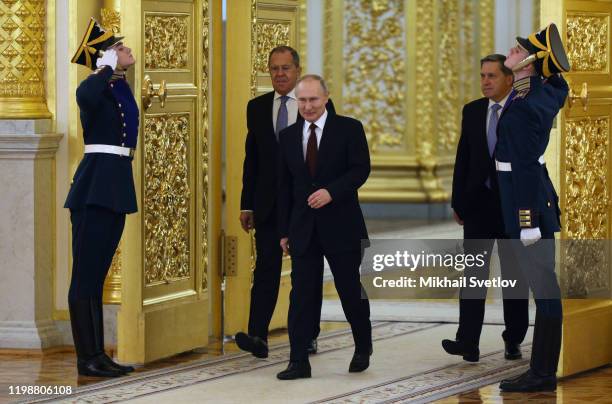 Russian President Vladimir Putin and Russian Foreign Ministers Sergei Lavrov attend the ceremony for President Putin receive credentials from newly...