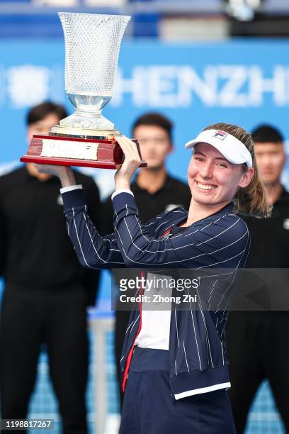 Ekaterina Alexandrova of Russia reacts with trophy after winning over the final match against Elena Rybakina of Kazakhstan on Day 7 of 2020 WTA...