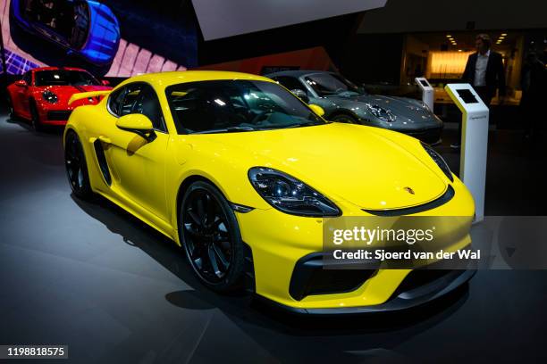 Porsche 718 Cayman GT4 sports car on display at Brussels Expo on January 9, 2020 in Brussels, Belgium. The 718 Cayman GT4 is a more powerful model...