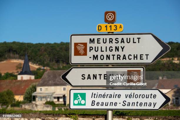 road signs, famous wines and villages of the cote de beaune, burgundy, france - beaune france stock pictures, royalty-free photos & images