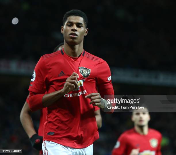Marcus Rashford of Manchester United celebrates scoring their second goal during the Premier League match between Manchester United and Norwich City...