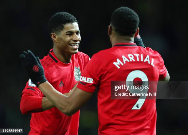 Marcus Rashford of Manchester United celebrates with Anthony Martial after scoring his team's second goal during the Premier League match between...