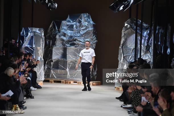 Fashion designer Neil Barrett acknowledges the applause of the audience at the Neil Barrett fashion show on January 11, 2020 in Milan, Italy.