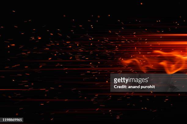 firework spark in high speed with black background - winter and warm glow stock-fotos und bilder