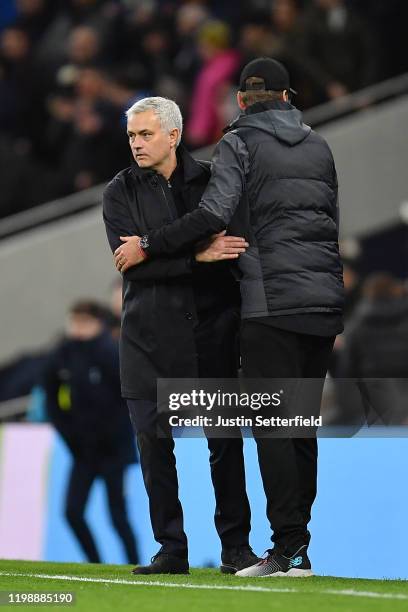 Jose Mourinho, Manager of Tottenham Hotspur shakes hands with Jurgen Klopp, Manager of Liverpool after the Premier League match between Tottenham...