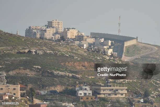 View of the wall separating East Jerusalem from the Palestinian village of Abu Dis, the proposed Palestinian capital in US President Donald Trump...