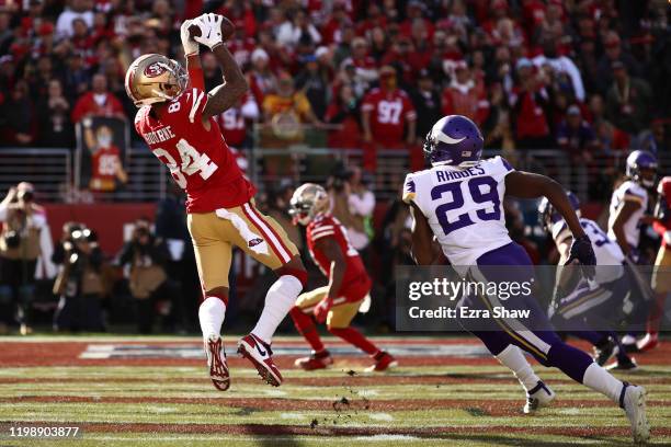 Kendrick Bourne of the San Francisco 49ers catches a touchdown pass during the first quarter against the Minnesota Vikings during the NFC Divisional...