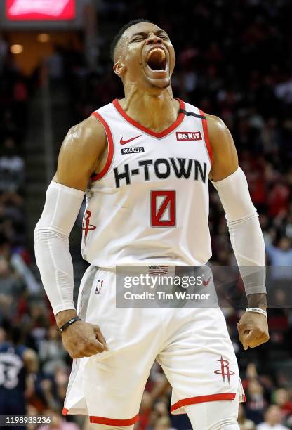 Russell Westbrook of the Houston Rockets reacts after a three point shot in the second half against the Minnesota Timberwolves at Toyota Center on...