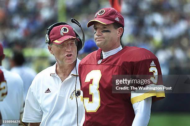 Marty Schottenheimer gives an ear full to Redskin Jeff George during first quarter action against the Chargers at Qualcomm Stadium, San Diego,...