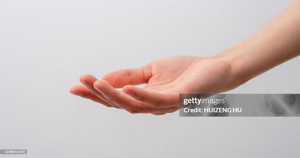 Female hand, Young woman hand trying to reach for