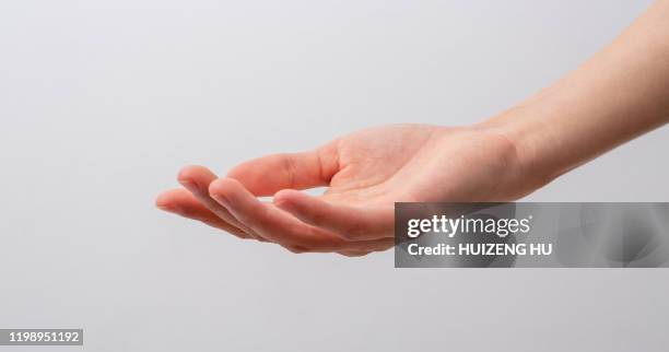 female hand, young woman hand trying to reach for - open hand stock pictures, royalty-free photos & images