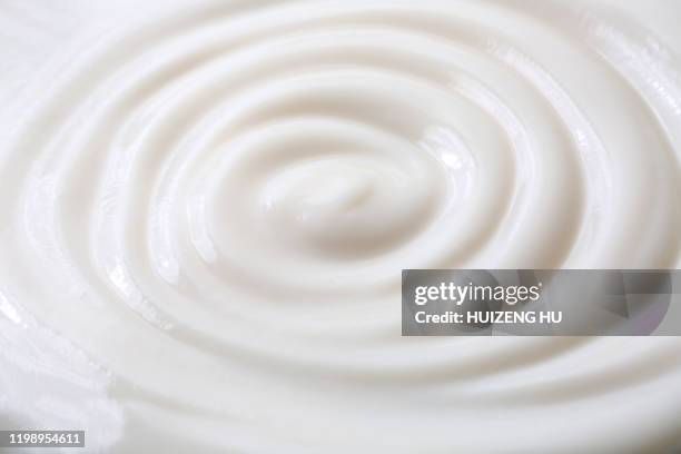 milky cream, yogurt swirl surface, backgrounds - cream coloured imagens e fotografias de stock