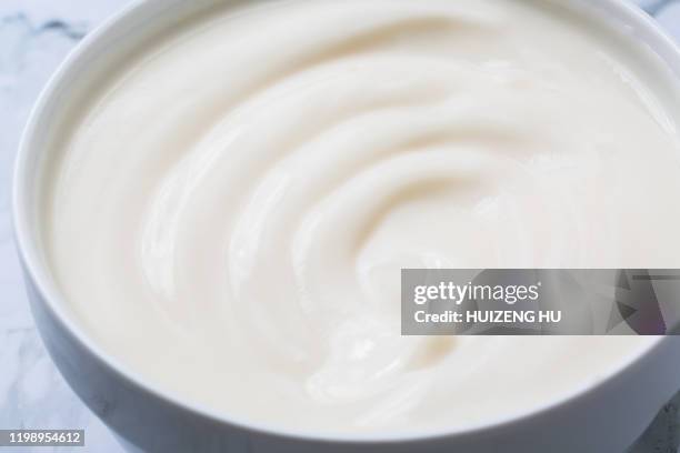 yogurt. close up of greek creamy, yogurt texture background. - yogurt swirl stock pictures, royalty-free photos & images