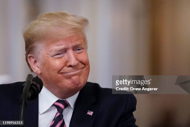 President Donald Trump arrives to speak to the media in the East Room of the White House one day after the U.S. Senate acquitted him on two articles...