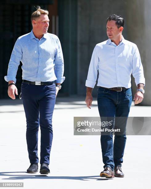 Shane Warne and Ricky Ponting arrive to speak to the media during a Cricket Australia media opportunity at Melbourne Cricket Ground on January 12,...