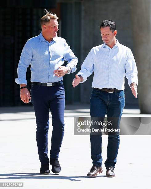 Shane Warne and Ricky Ponting arrive to speak to the media during a Cricket Australia media opportunity at Melbourne Cricket Ground on January 12,...